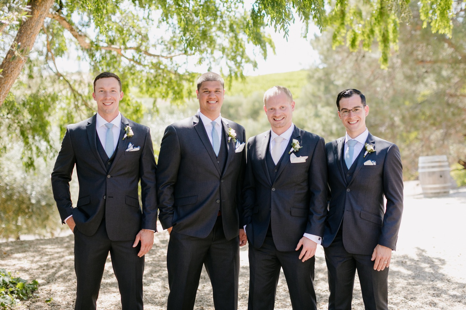 Groomsmen posing for portraits at terra mia wedding in paso robles, california