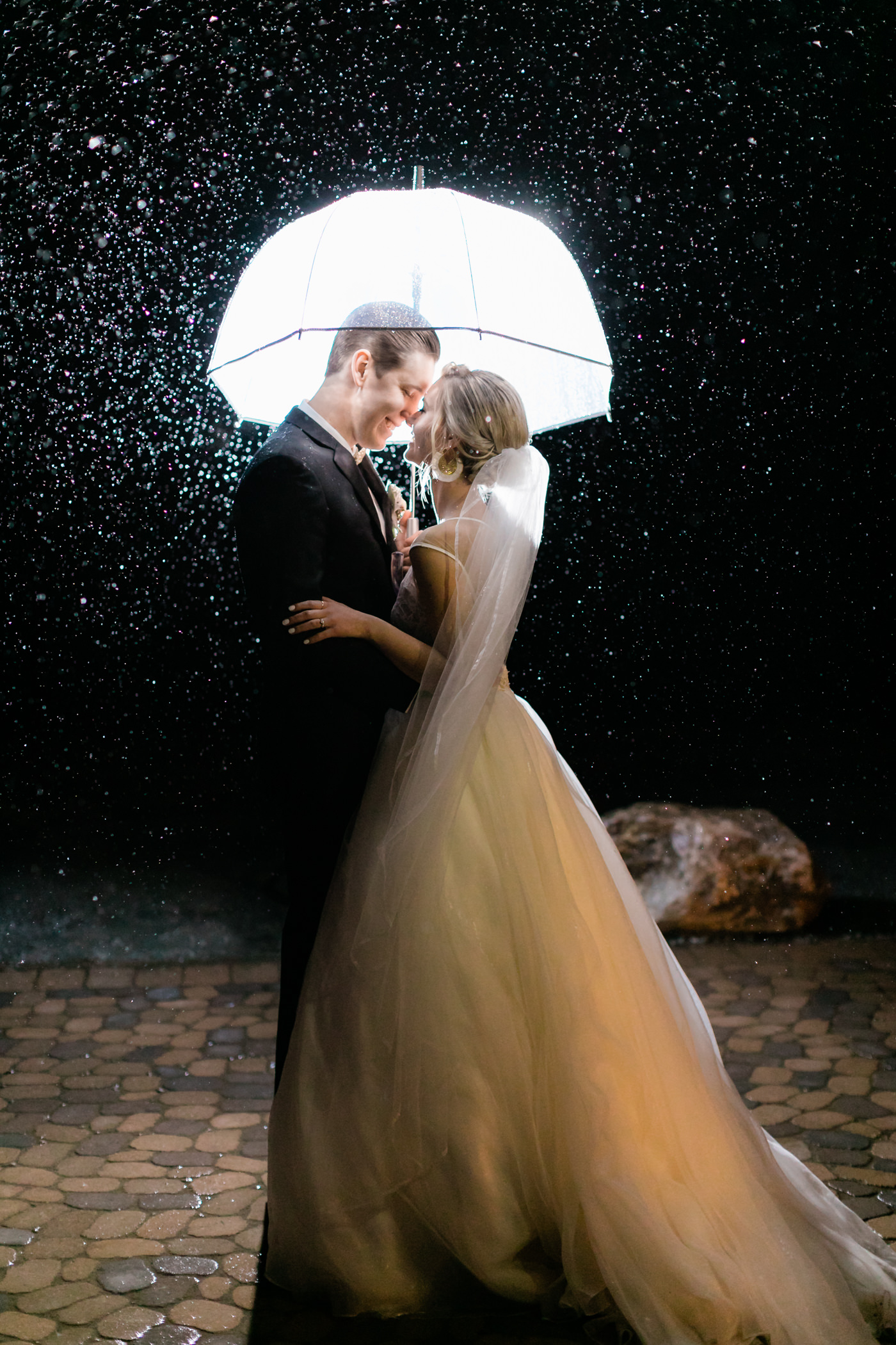 Rainy Oyster Ridge Wedding photo at night by Tayler Enerle