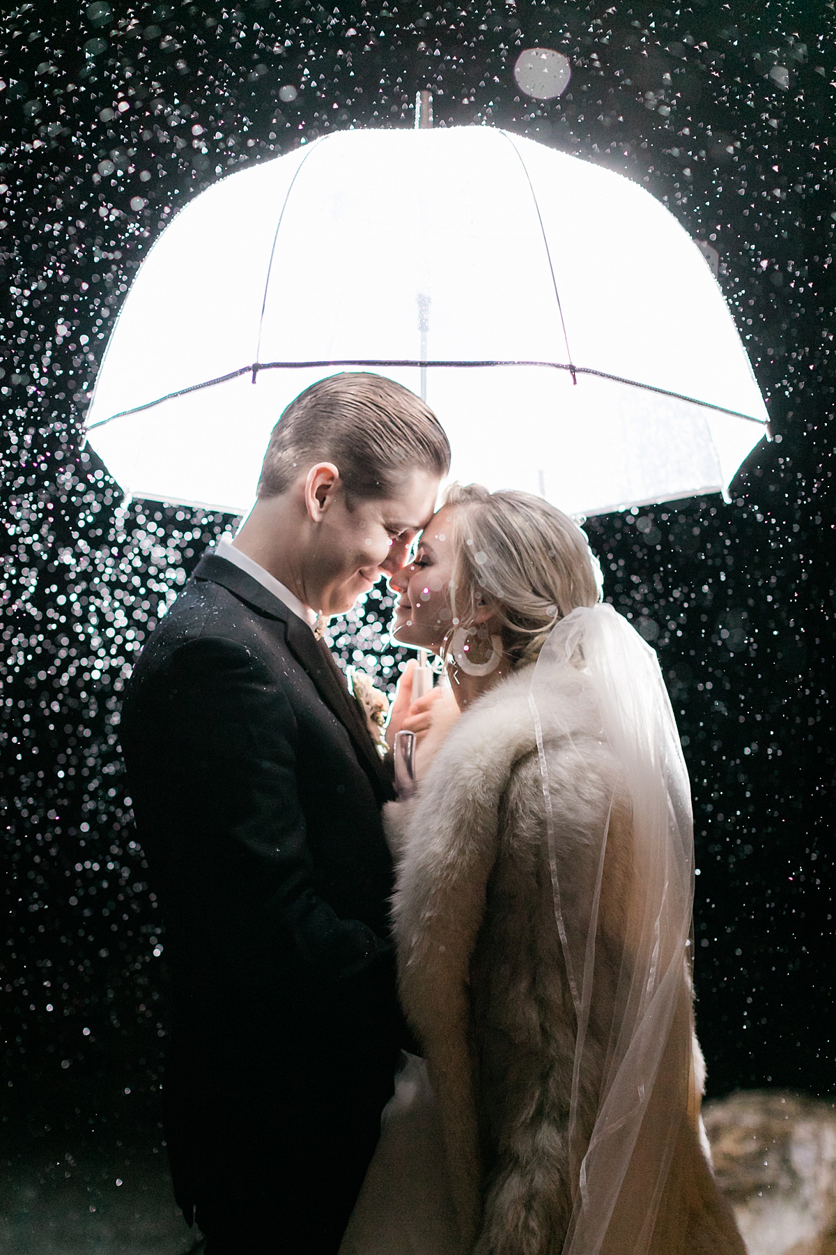 Magical Rain photo at Oyster Ridge Winery wedding by Tayler Enerle