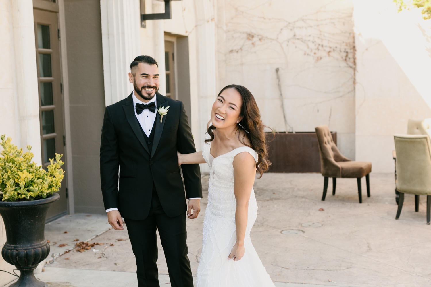 First look between bride and groom at tooth and nail winery
