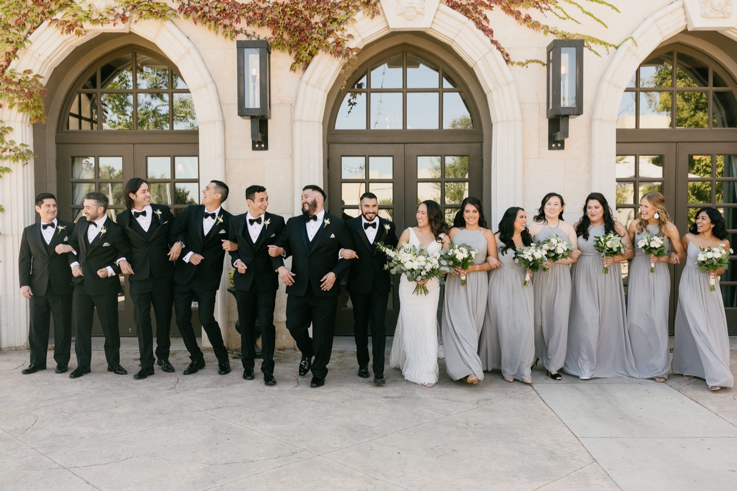 wedding party portrait candid at tooth and nail winery in paso robles, ca by tayler enerle Photography