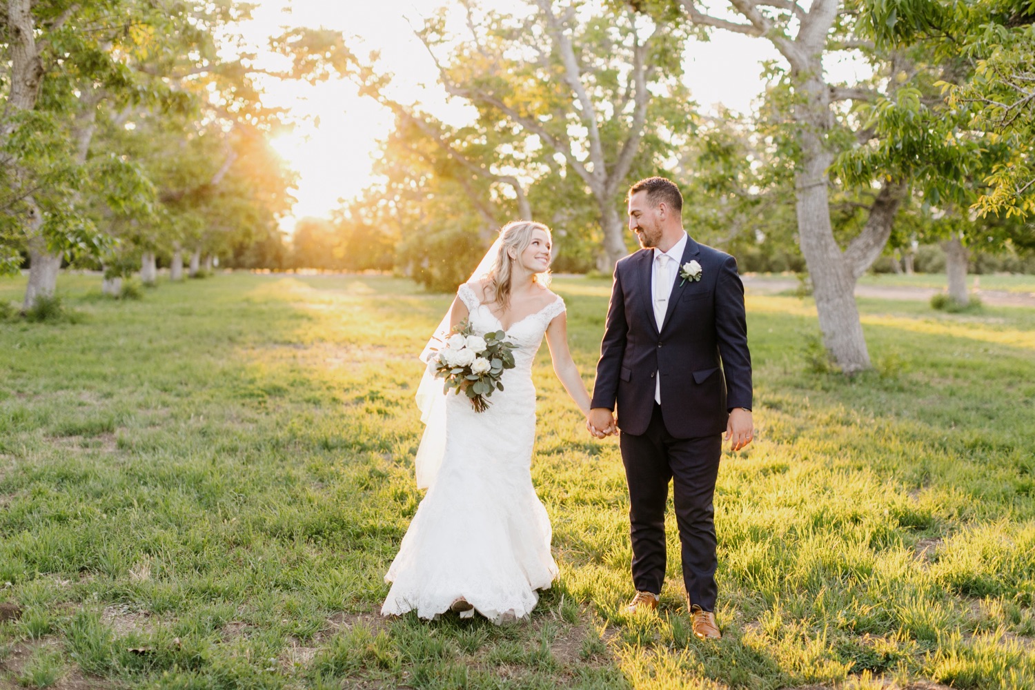 sunset portraits of kelly and nick at their walnut grove wedding